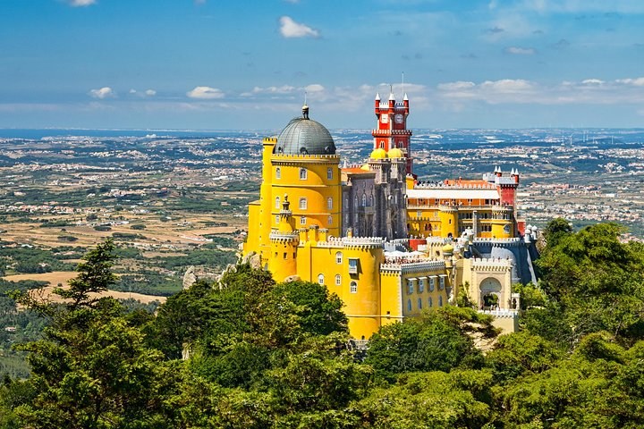 Pena Palace above the Sintra hills, seen from the palace approach