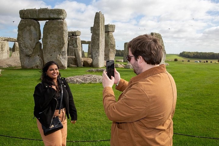 The sarsen stones of Stonehenge under a grey sky on Salisbury Plain, Wiltshire
